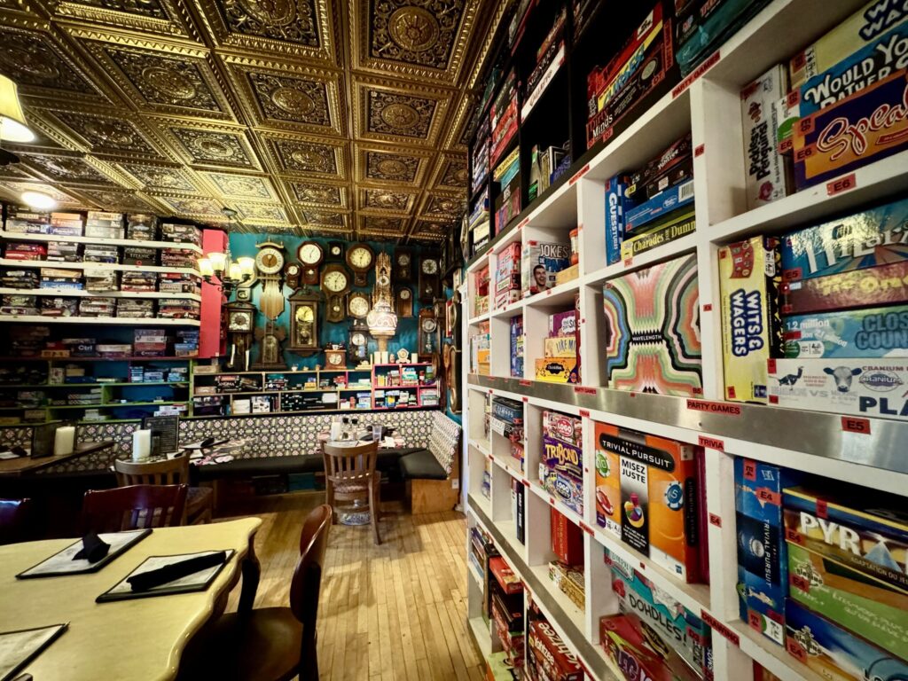 Thousands of board games are visible in a forced perspective photograph of Le Moque-Tortue's dining room, in Shediac NB.
