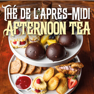 A two-tiered tray of sweets made by Adorable Chocolat are served for afternoon tea.