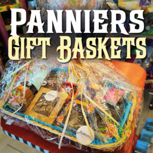 A large gift basket full of chocolates, caramels, and other types of sweets. The "Adorable Chocolat" logo is featured prominently on the stickers.